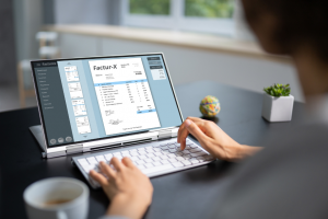 Archivage Factur-X sur ordinateur - interface gestion factures électroniques 2026 - Admin'Up assistante administrative Hauts de Somme
